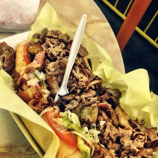 With bacon, peppers, onions, tomatoes and lettuce