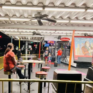 A few outdoor tables. It can be noisy from the big roads