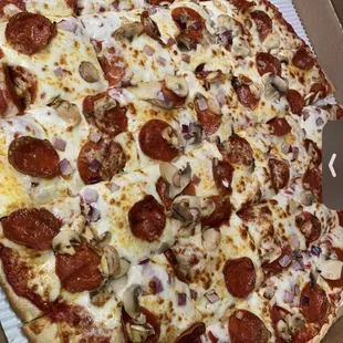 a pepperoni pizza in a box