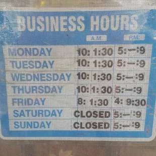 a business hours sign