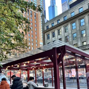 Standing room only gazebo, no seats.