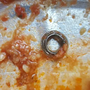 a close up of a piece of pizza