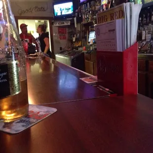a bottle of beer on the bar