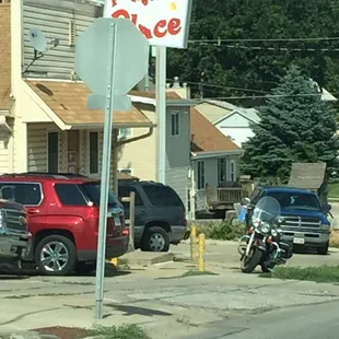 parked cars and a motorcycle
