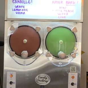 a close up of a soda machine