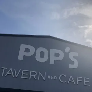 the sign for pop&apos;s tavern and cafe