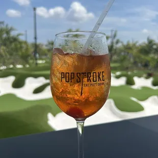 a drink in a glass with a straw