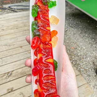 Fruit pop with chamoy and gummies