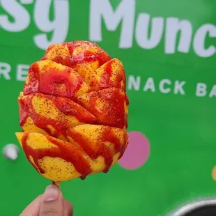 Mango on a stick with Chamoy