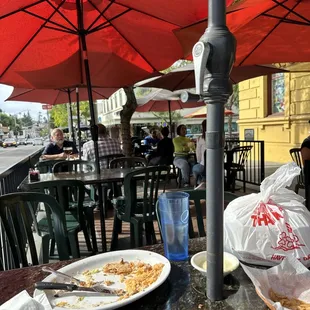 a table with food and umbrellas