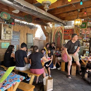 a group of people sitting at tables