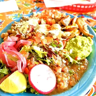 Por que plate with pollo asada and rice and beans