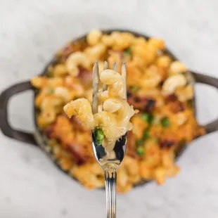 Baked Mac &amp; Cheese Cavatappi noodle, thick-cut bacon, english peas, parmesan crust