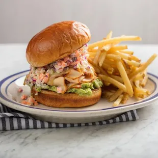 Mother Clucker Roasted chicken breast, guacamole, carrot slaw, pepper jack