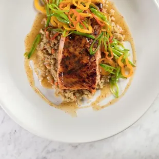 Grilled Salmon Brown butter mustard glaze, roasted mini pepper, snap pea, quinoa pilaf