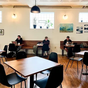 two people working on their laptops