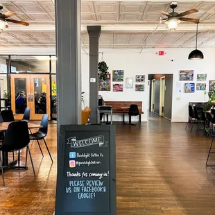 a blackboard sign in a coffee shop