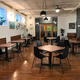 tables and chairs in a coffee shop
