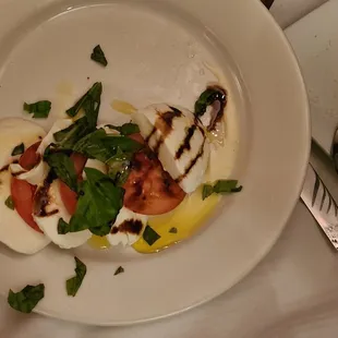 Caprese - fresh mozzarella, vine tomatoes Evoo, basil, with aged balsamic drizzle