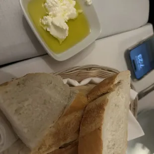 Olive oil, fresh ricotta and fresh bread