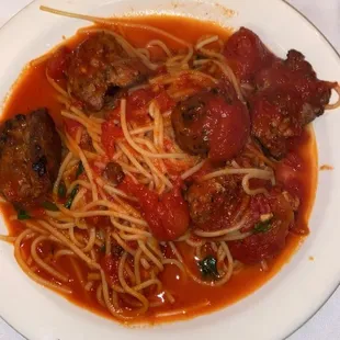 spaghetti with Italian sweet sausage and red gravy sauce