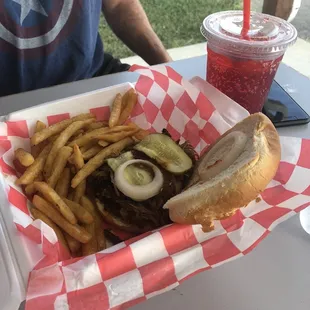 Pulled pork sandwich, fries, and Cherry Soda