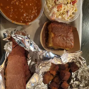2 meat platter with burnt ends and brisket. Classic sides of creamy coleslaw, beans, and cornbread. Simple and perfect