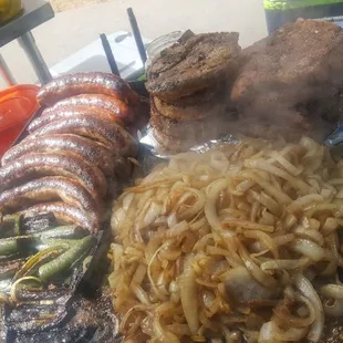 a variety of food on a grill