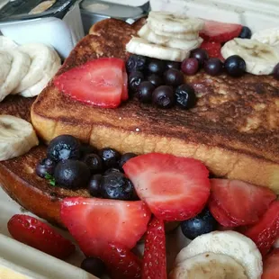 French Toast ($9.95 for 2 pieces), add Mixed Fruits (+$3.25), Caviar
