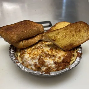 Baked Spaghetti with Garlic toast.