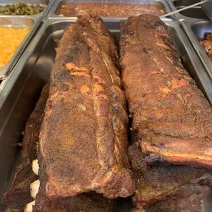 Smoked Baby Back ribs, creamy macaroni and cheese, collard greens with a little kick and our delicious pressure fried chicken.