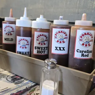 5 of the 7 sauces, these are on all tables the others are OMG (ghost pepper) and Afterburner and these two are on the counter