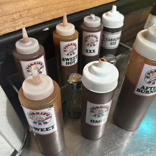 a variety of ketchup bottles