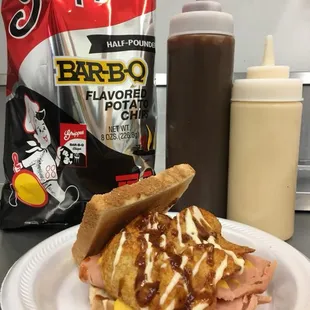 Pop's Porkland Round Steak (smoked bologna with nacho cheese, Grippos(TM) and a drizzle of red and white bbq sauce)
