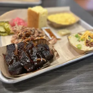 Burnt Ends, pulled pork, loaded grits, Mac and cheese.