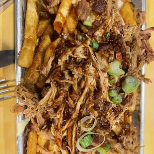 Texas Poutine with BBQ Pork but had the choice of brisket or half and half. This is a popular dish and was sooooo good!!