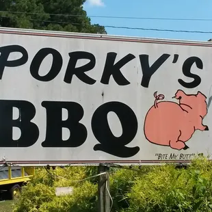 a sign for porky&apos;s bbq