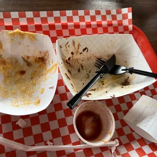 Empty containers - the mac n cheese and brisket were *chef kiss*