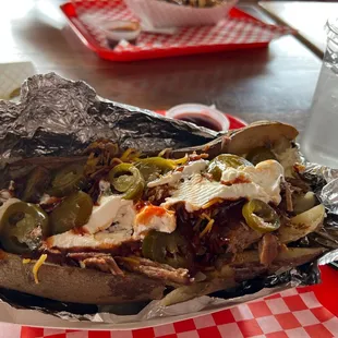 Loaded chopped brisket baked potato with all the fixins