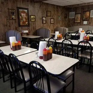 Big bottles of the best bbq sauce on every table