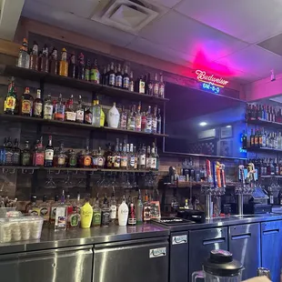 a bar with a neon sign