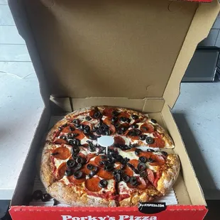 Medium Medium Cheese Pizza with pepperoni and black olives