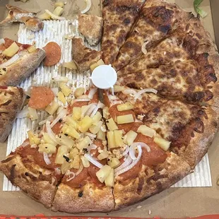 a whole pizza in a box