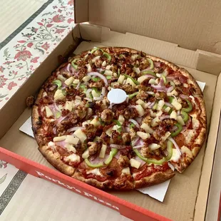 Large meat with addition of red onions, bell peppers, and pineapple !