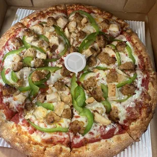 Chicken, sausage, and green bell pepper medium pizza