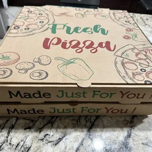 a pizza box on a counter