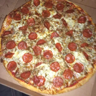 a pepperoni pizza in a box