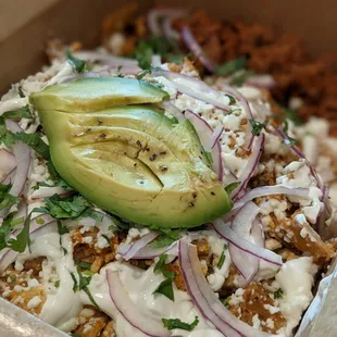 Chilaquiles with chorizo - love the refried beans