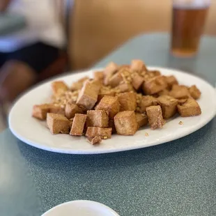a plate of tofu on a table