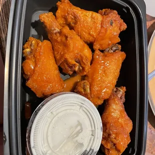 Buffalo wings.  Nice and juicy yet crispy. Good spice level!  Great ranch.